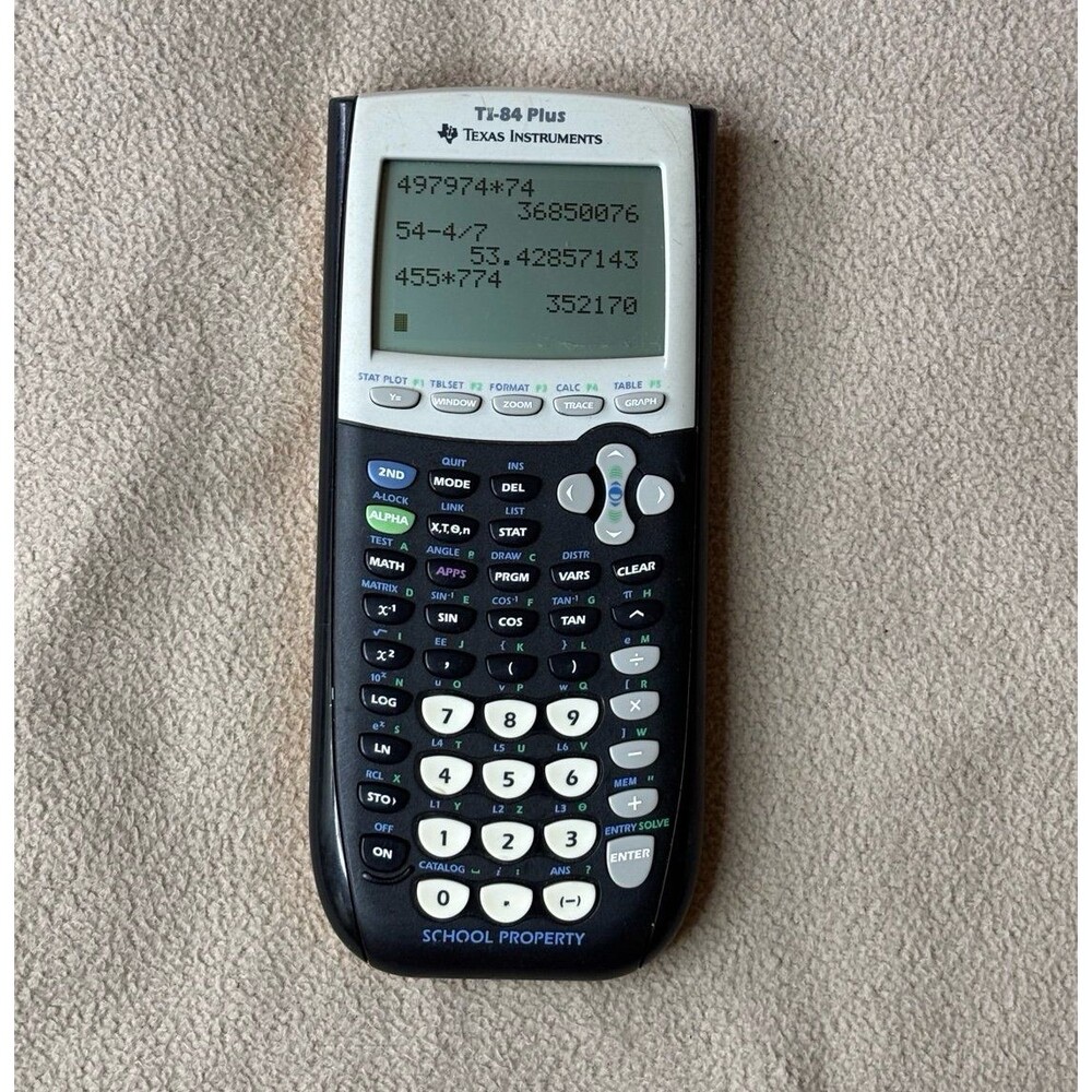 Texas Instruments TI-84 Plus Graphing Calculator Black Yellow School Property